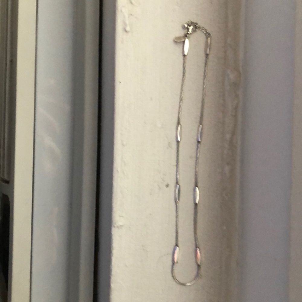Silver/metal in color necklace